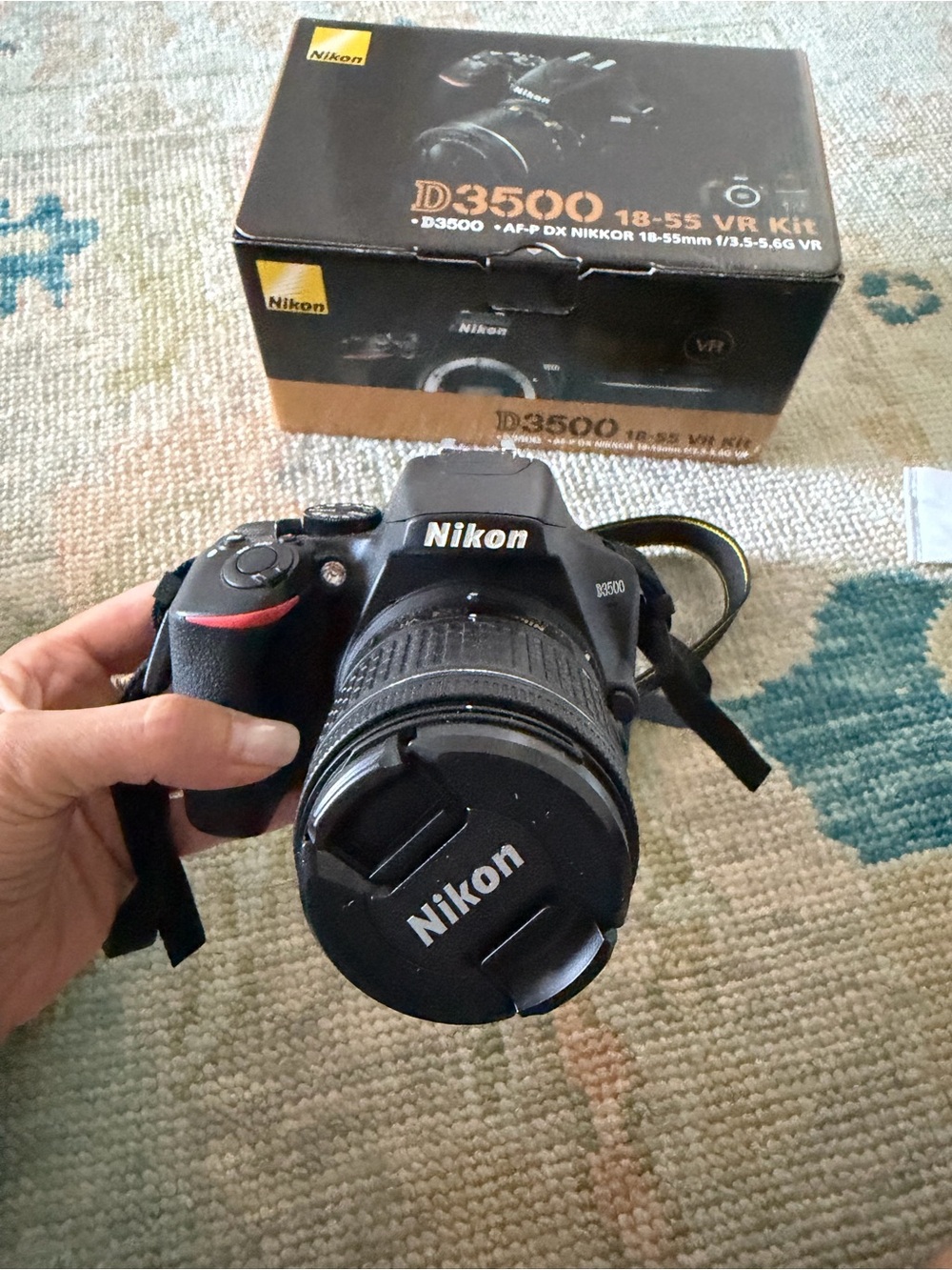 Nikon Black DSLR with 18-55mm Lens and Branded Strap